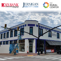 Building with logos of businesses above