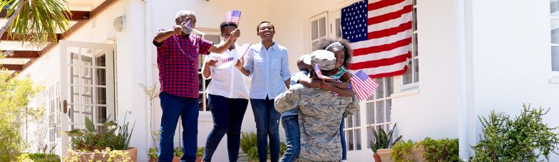 American solider hugging daughter and celebrating his homecoming to family.